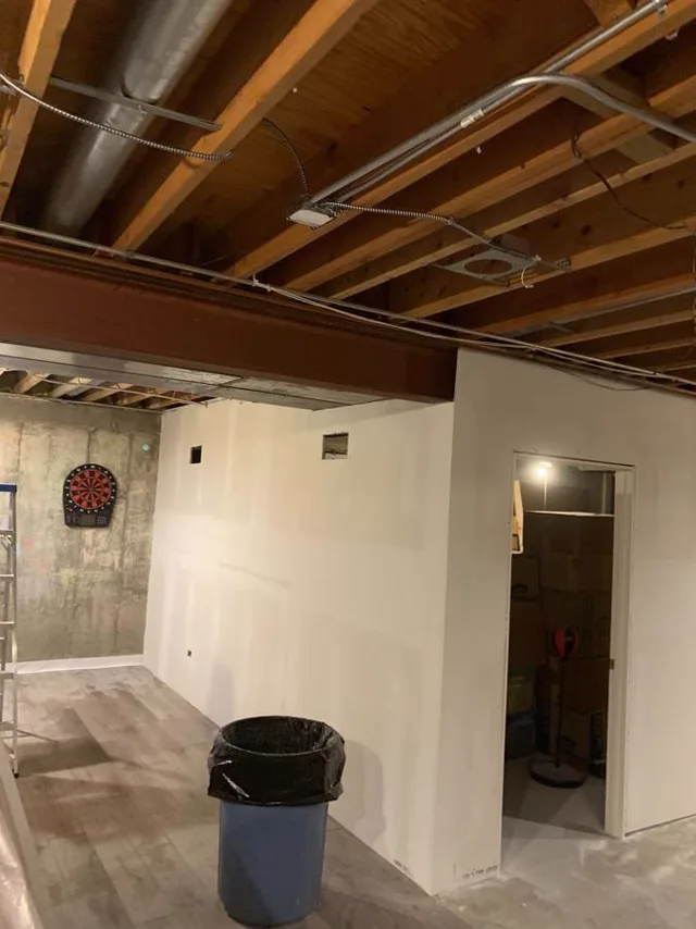 Wall joints taped and coated with joint compound